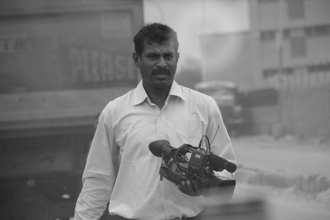 news reporter interviewing official