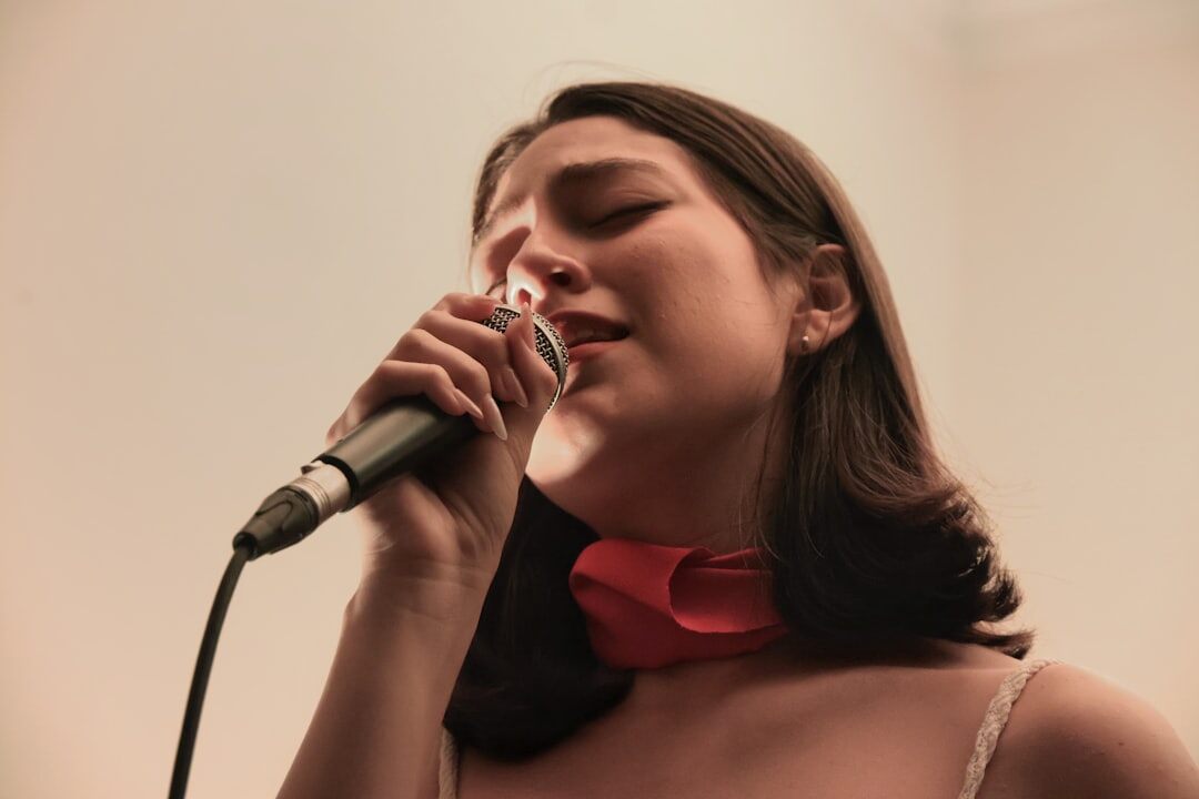 young female singer performing on stage